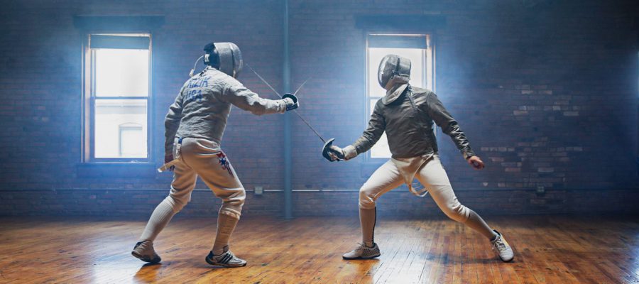 Scene from video: two athletes fencing
